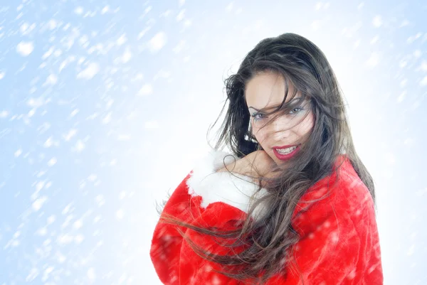 Šťastné ženy santa v sněhové bouři — Stock fotografie