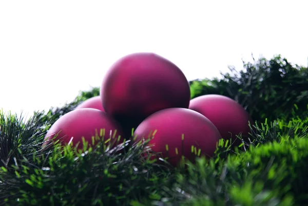 Claret christmas balls and green decoration — Stock Photo, Image