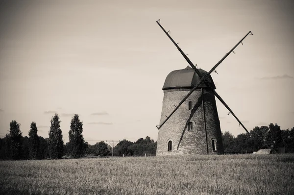 stock image Windmill on farm field