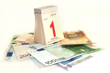 Many euro notes with Calendar on a white background clipart