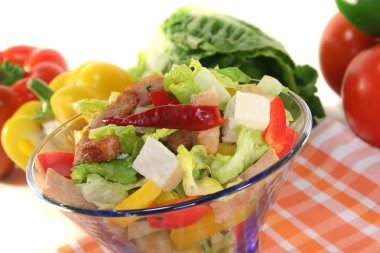 Mixed salad with turkey strips and fresh herbs clipart