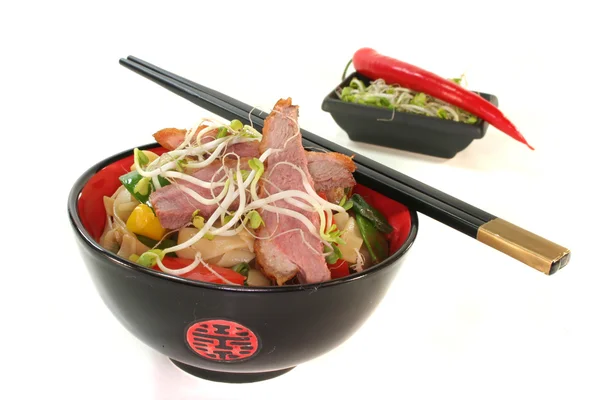 Duck breast with fried noodles — Stock Photo, Image