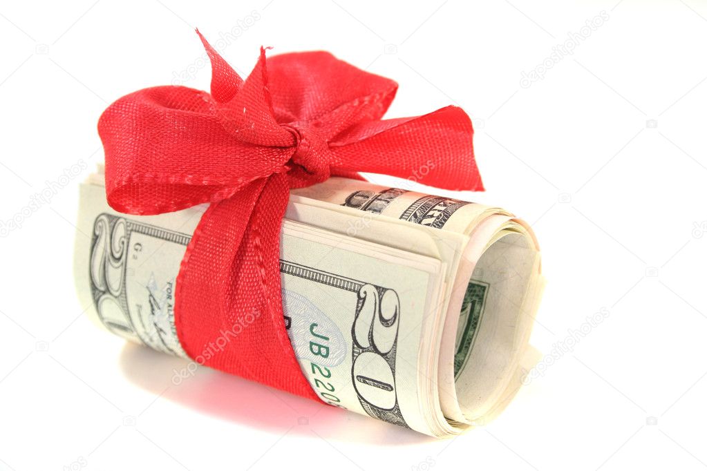Many dollar bills with a red bow on white background