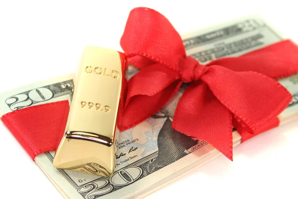 Gold bars on dollar bills — Stock Photo, Image