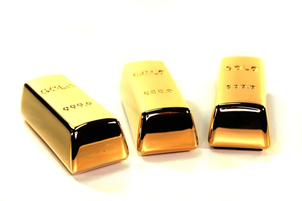 Tres lingotes de oro —  Fotos de Stock