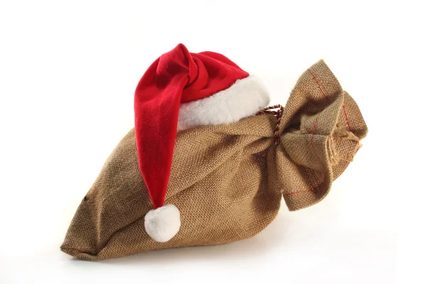 Noel Baba şapkası ile çanta — Stok fotoğraf