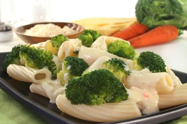 Tortiglione with broccoli cheese sauce clipart