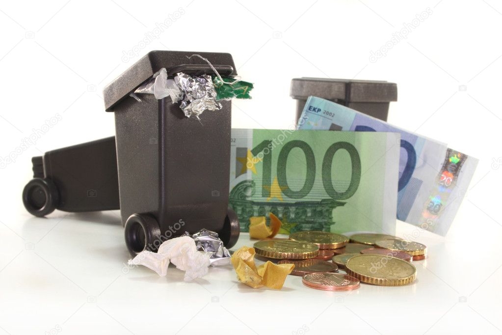 Garbage cans and money on a white background