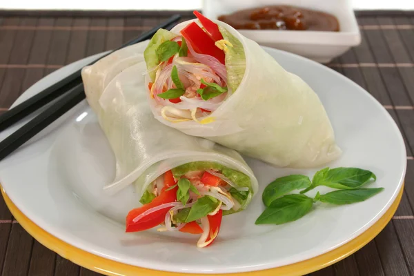 stock image Rice paper filled with salmon, peppers and sprouts