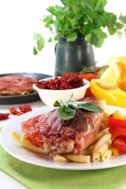 Saltimbocca with pasta and grilled vegetables clipart