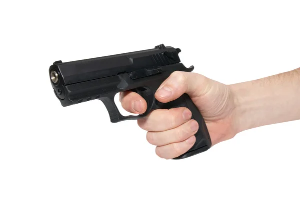 Pistolet noir dans une main — Photo