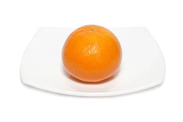 Orange mandarin on the plate. — Stock Photo, Image