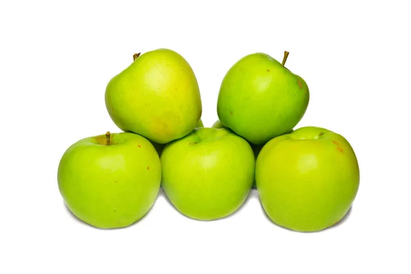 Stack of green apples isolated on white. — Stock Photo, Image