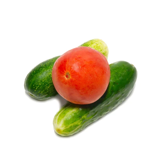 Cucumbers and red tomato isolated on white. — Stock Photo, Image