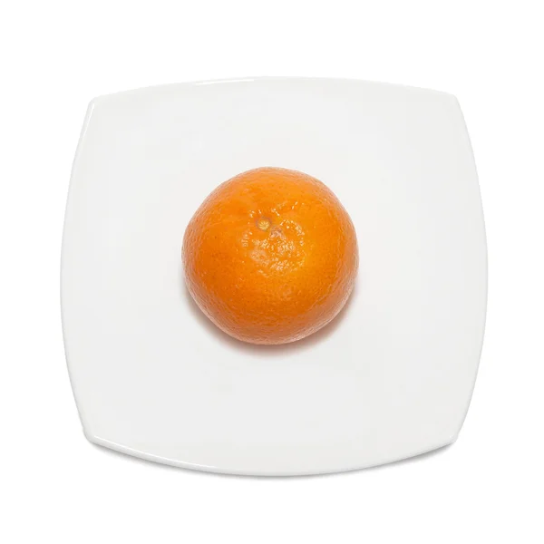 Mandaryn pomarańczowy na talerzu. — Zdjęcie stockowe