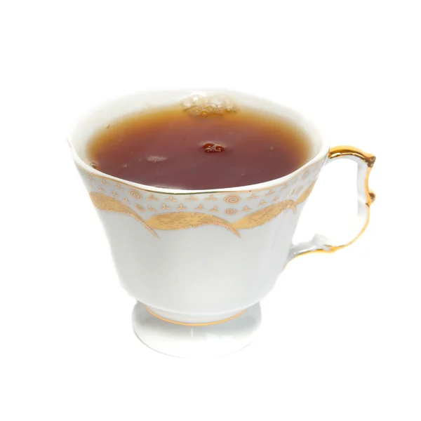 Tazza da tè con tè isolato su bianco . — Foto Stock
