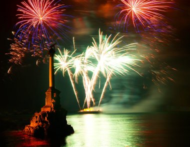 Salute, fireworks above the Sevastopol bay. clipart