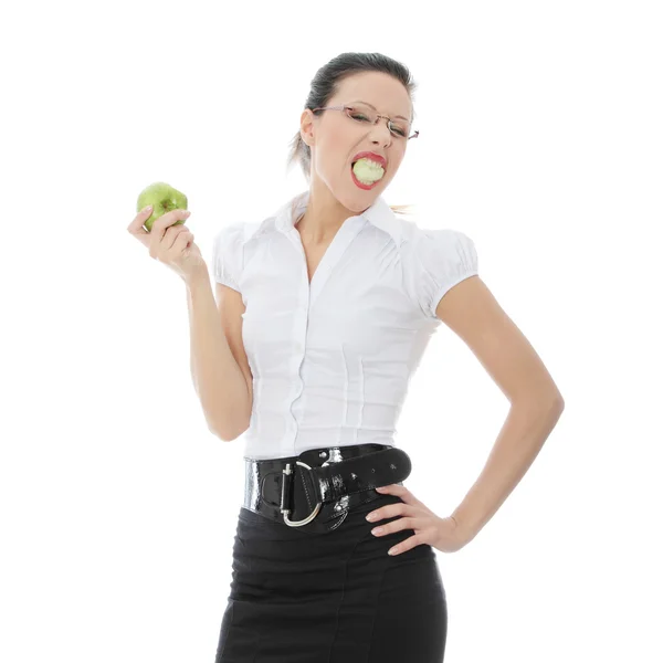 Affärskvinna med grönt äpple — Stockfoto