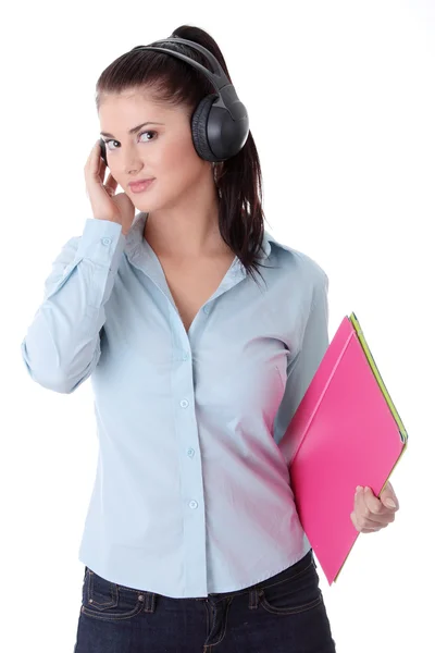 Glad student tjej lyssnar på musik — Stockfoto