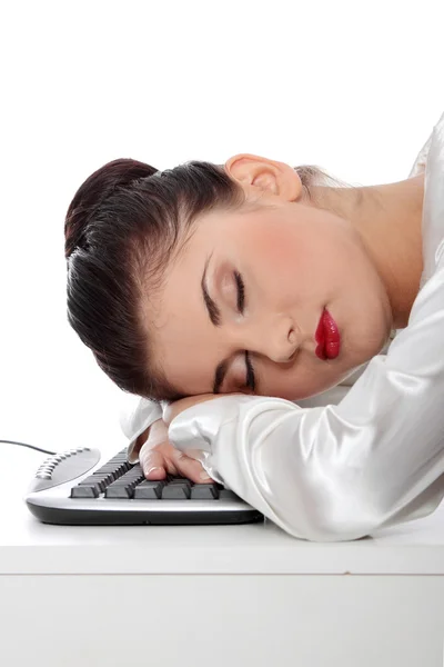 Zakenvrouw slapen op het toetsenbord — Stockfoto