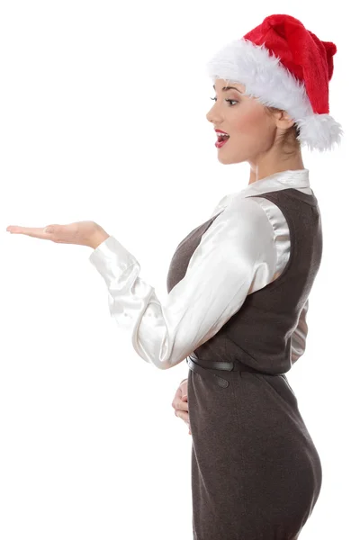 Jonge lachende vrouw met rode kerstmuts — Stockfoto
