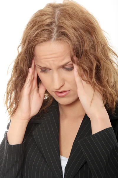 Young business woman with headache — Stock Photo, Image