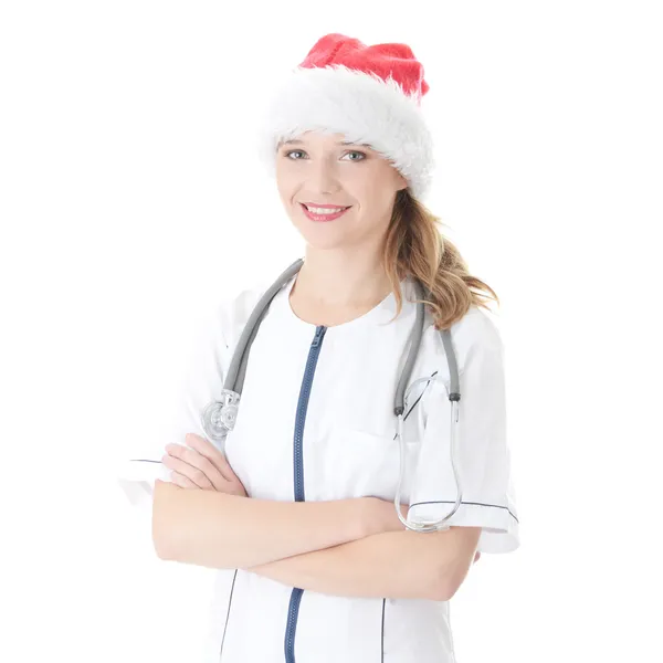 Dottore ragazza con con cappello di Babbo Natale — Foto Stock