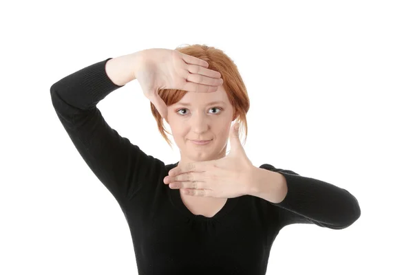 Young attractive woman framing her hands — Stock Photo, Image