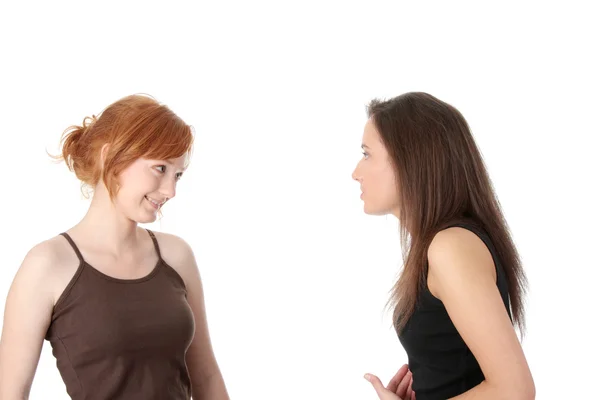 Две Молодые Женщины Говорят Изолированные Белом Фоне — стоковое фото