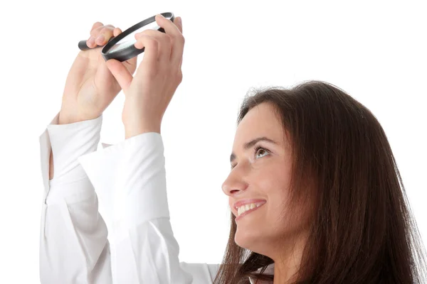 The woman with a magnifier — Stock Photo, Image