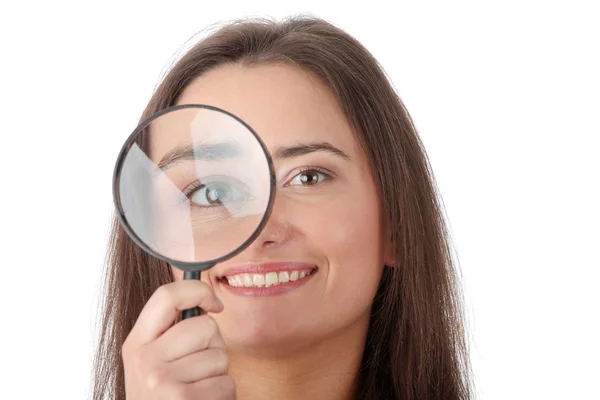 The woman with a magnifier — Stock Photo, Image