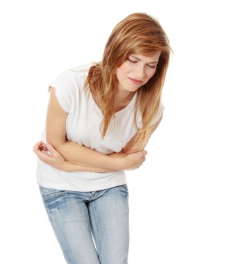 Teen woman with stomach issues,isolated on white clipart