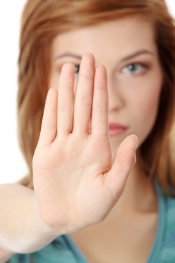 Hold on, Stop gesture showed by young woman hand clipart