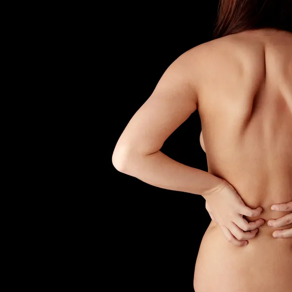 後ろから裸の女性 背中の痛みの概念 分離されました — ストック写真
