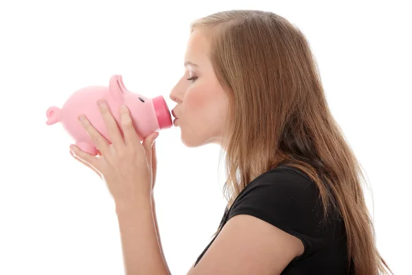 Young Teen Woman Kissing Piggy Bank Isolated White — Stock Photo, Image