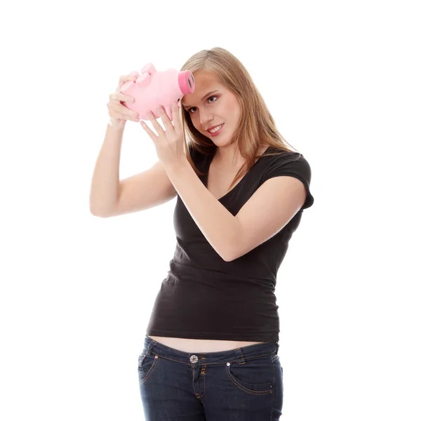Young Woman Trying Get Money Her Piggy Bank Isolated White — Stock Photo, Image