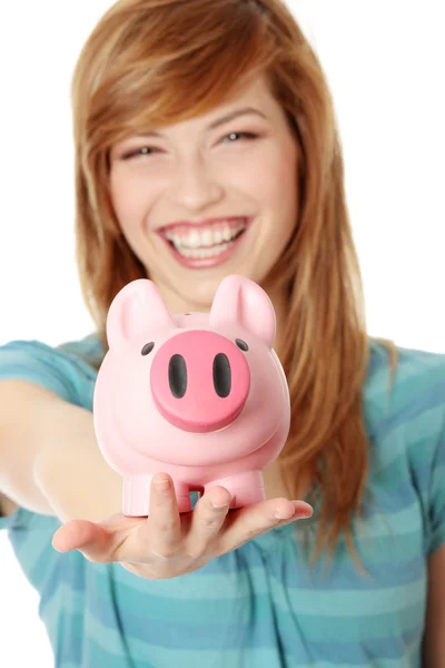 Fiatal Tini Megmutatja Neki Rózsaszín Piggy Bank Elszigetelt Fehér Background — Stock Fotó