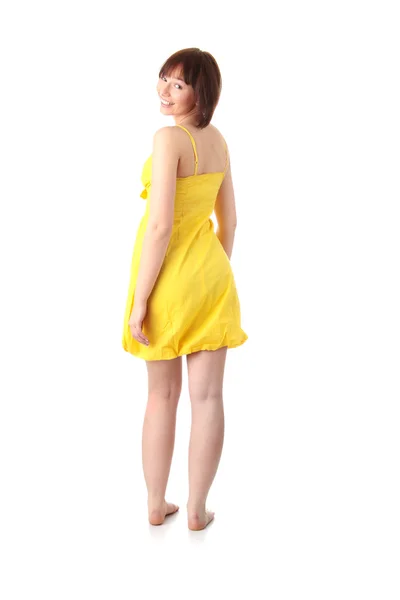 Dospívající dívka v žluté letní šaty — Stock fotografie