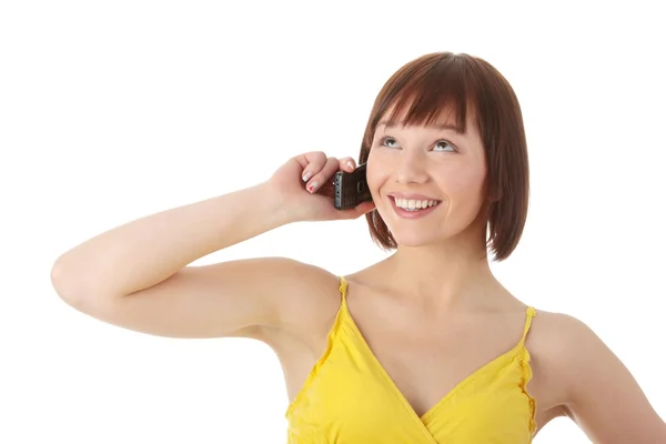 Młody Kaukaski Kobieta Żółtej Sukience Korzystania Telefonu Komórkowego Białym Tle — Zdjęcie stockowe