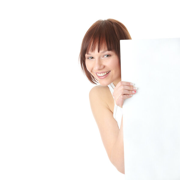 A pretty young woman holding a blank sign,isolated on white background