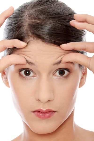 Woman Checking Her Wrinkles Her Forehead Isolated White Stock Picture