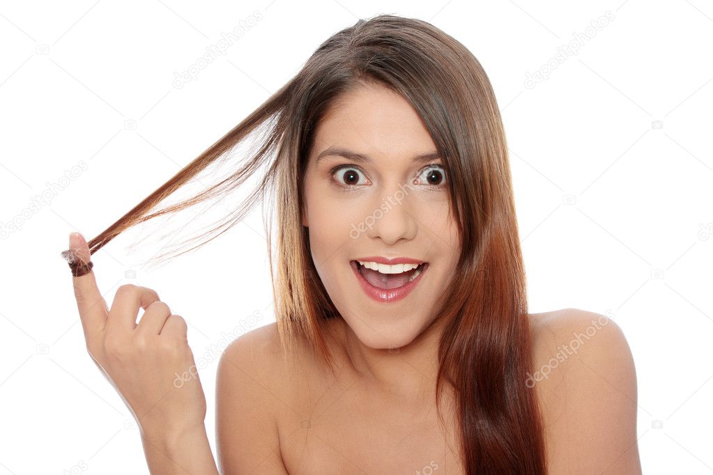 Beautiful young happy caucasian woman with healthy long hairs