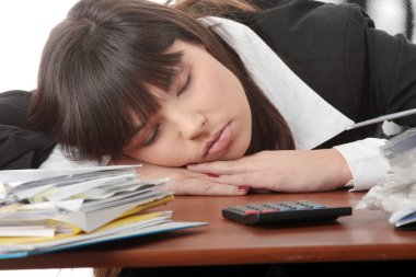 Sleeping female filling out tax forms while sitting at her desk. Isolated clipart