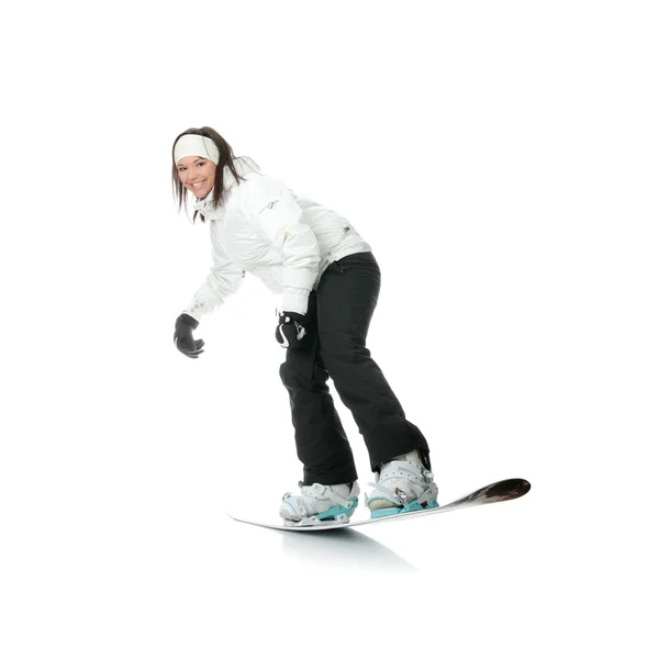 Stock image Young woman on snowboard isolated on white background