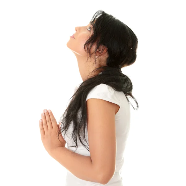 Mujer joven caucásica rezando —  Fotos de Stock