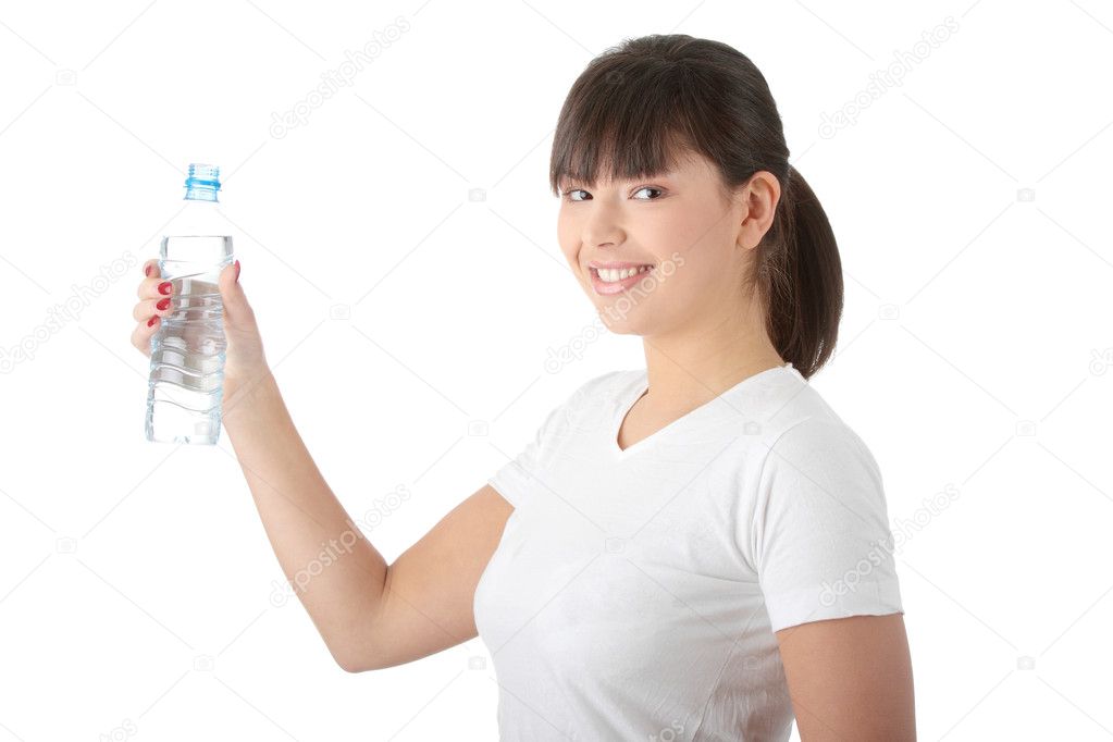 Young beautiful caucasian woman with bottle of mineral water, isolated on white background