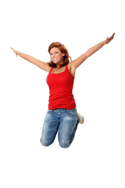 Havada atlama, genç, mutlu beyaz kadın — Stok fotoğraf