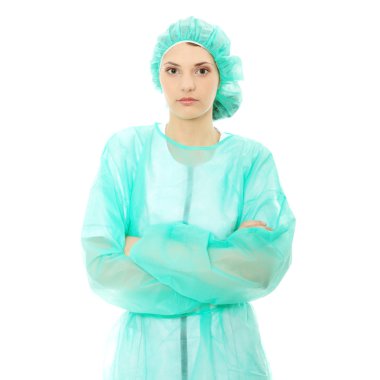 Portrait of female surgeon or nurse wearing protective uniform, isolated on white background clipart