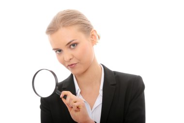 Businesswoman looking into a magnifying glass clipart