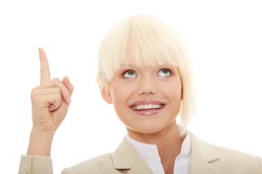 Young pretty office woman specifies with finger to up isolated on white clipart